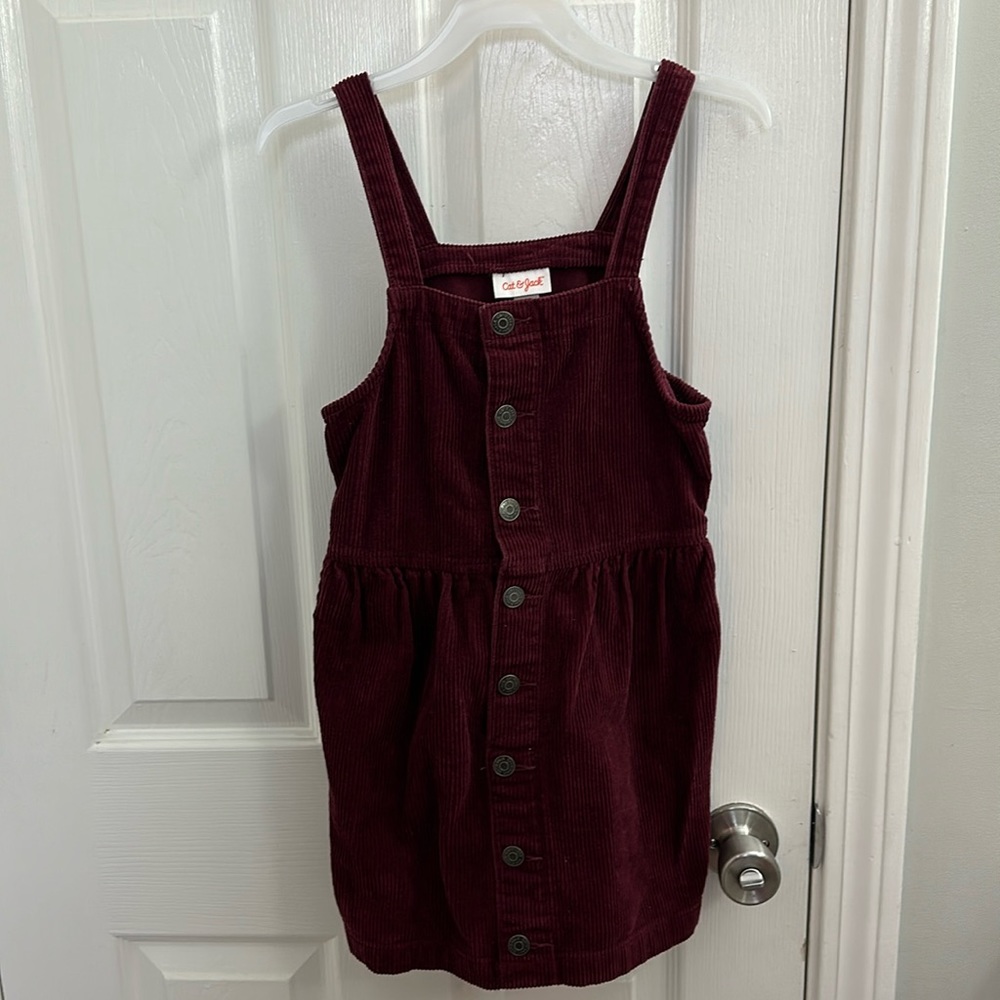 Maroon corduroy jumper.